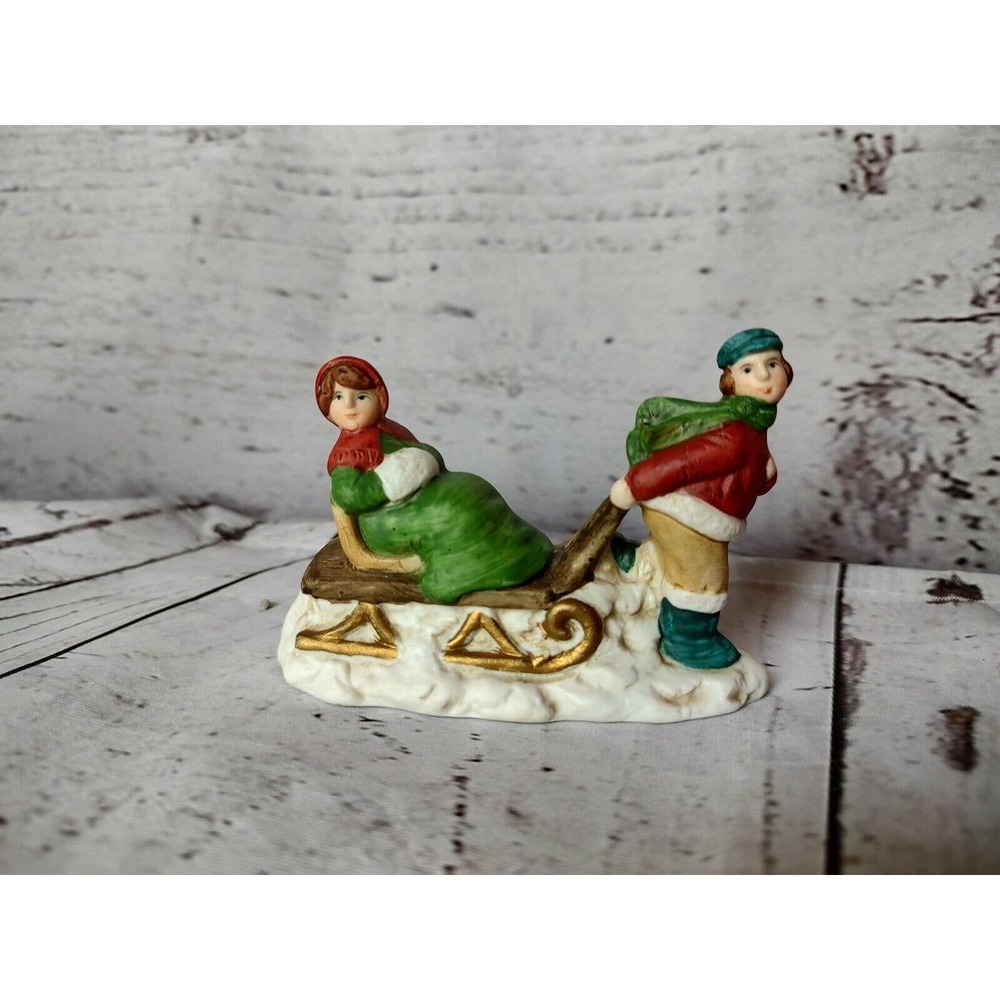 Russ Berrie A Victorian Christmas Porcelain Boy Pulling Sleighs Girl #9702